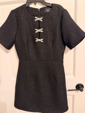 VICI Black Tweed Mini Dress with Rhinestone Bow Accents

Never been worn